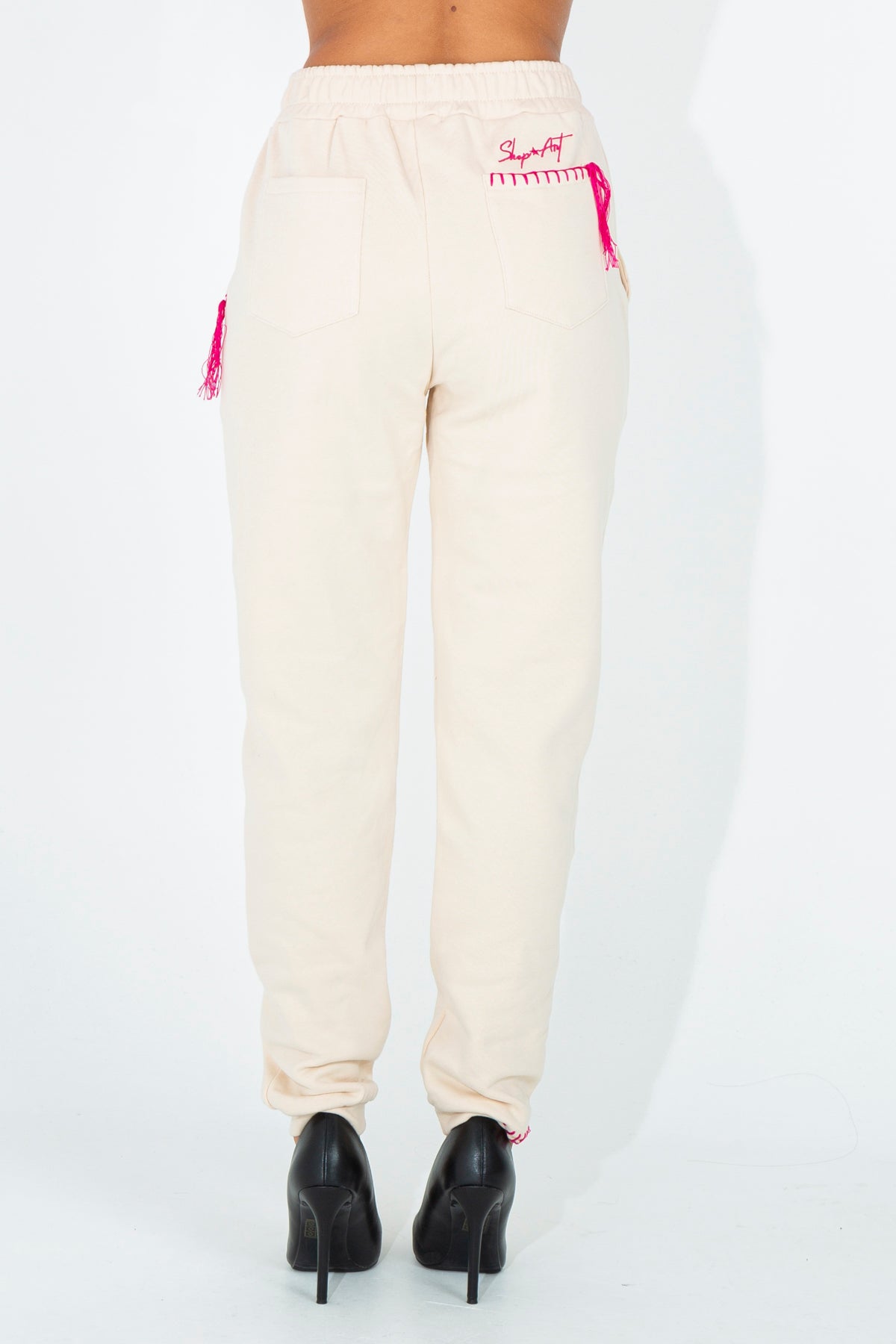 Tracksuit trousers with embroidered details