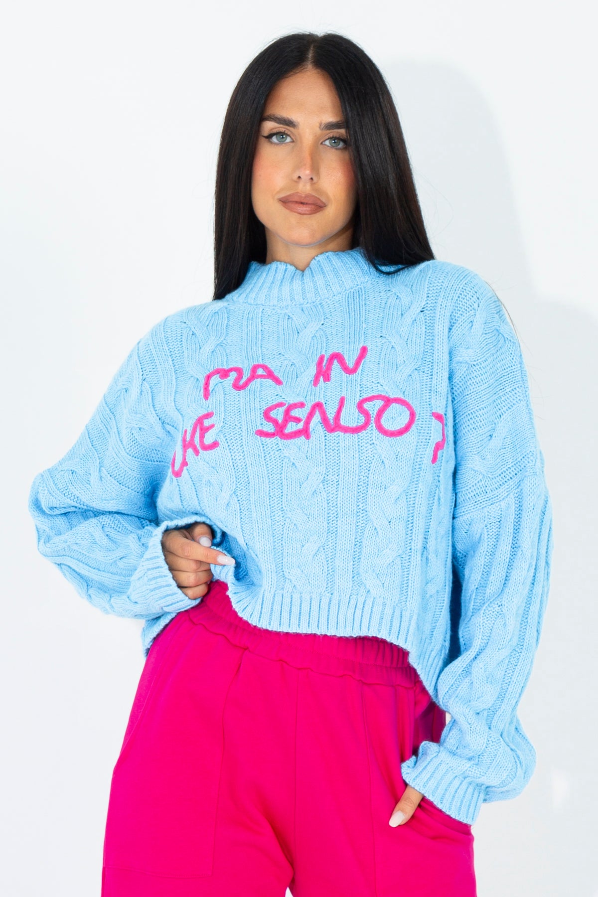 Mock neck sweater with embroidered phrase