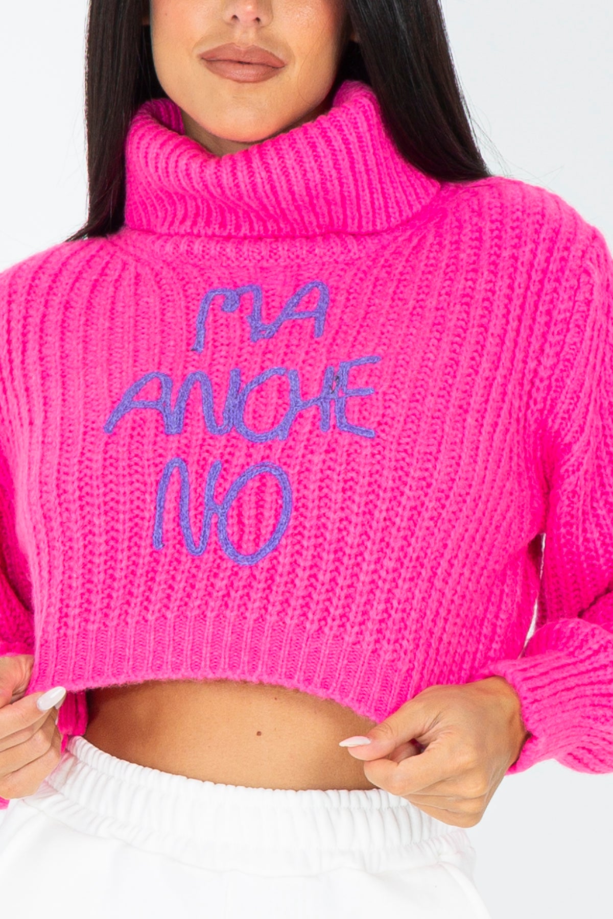 Crop turtleneck sweater with embroidered phrase