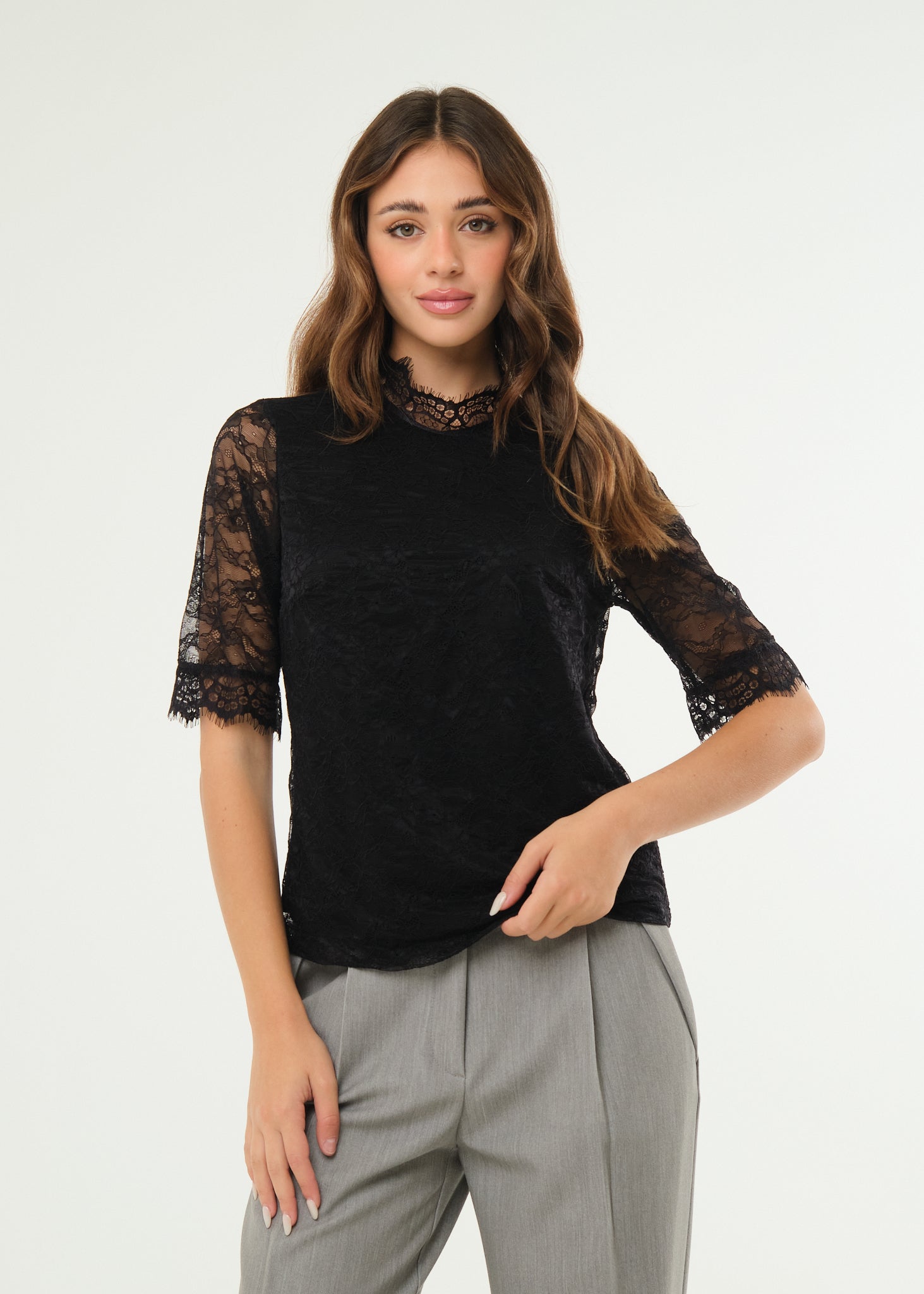 Maglia in pizzo elasticizzato