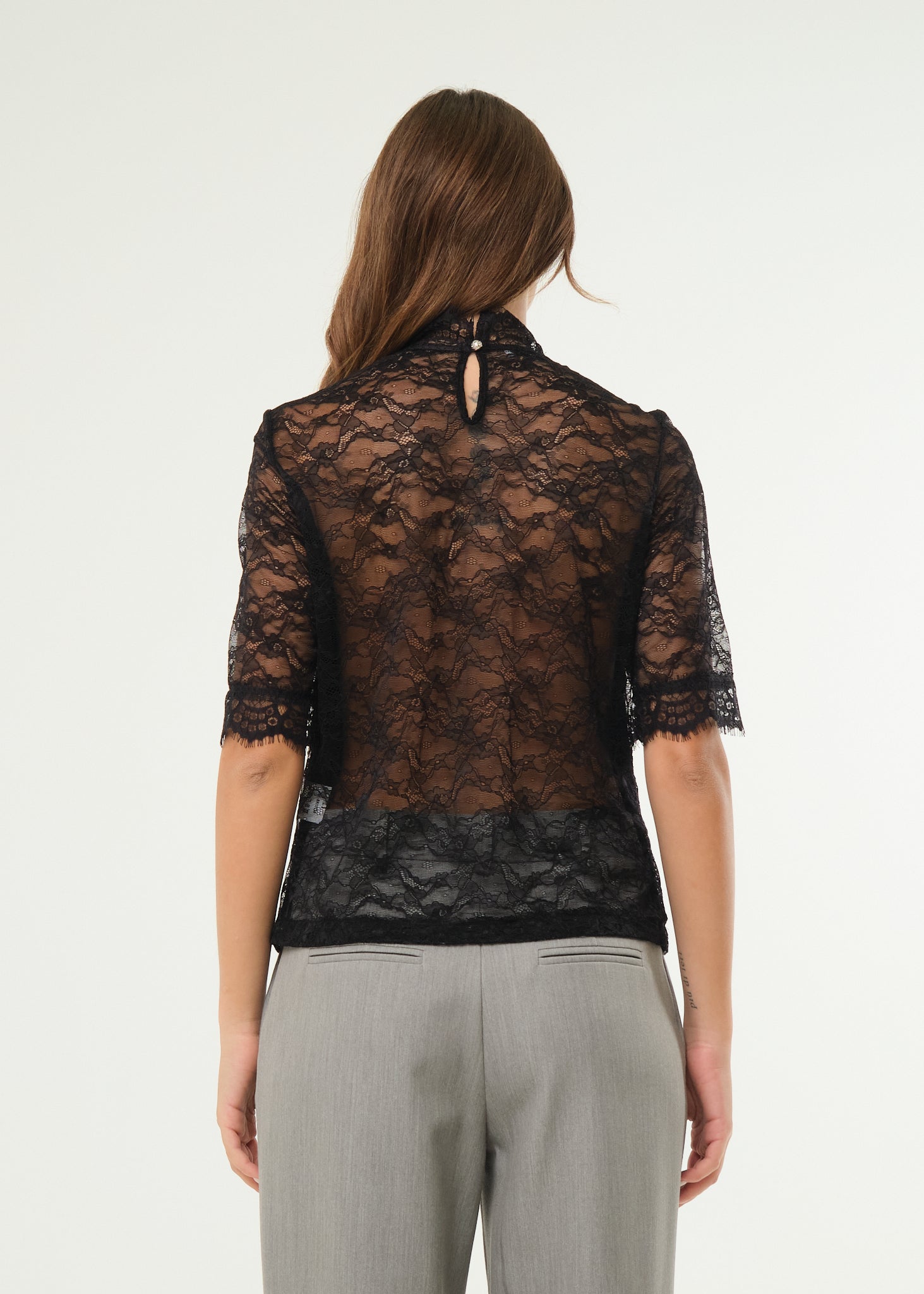 Maglia in pizzo elasticizzato