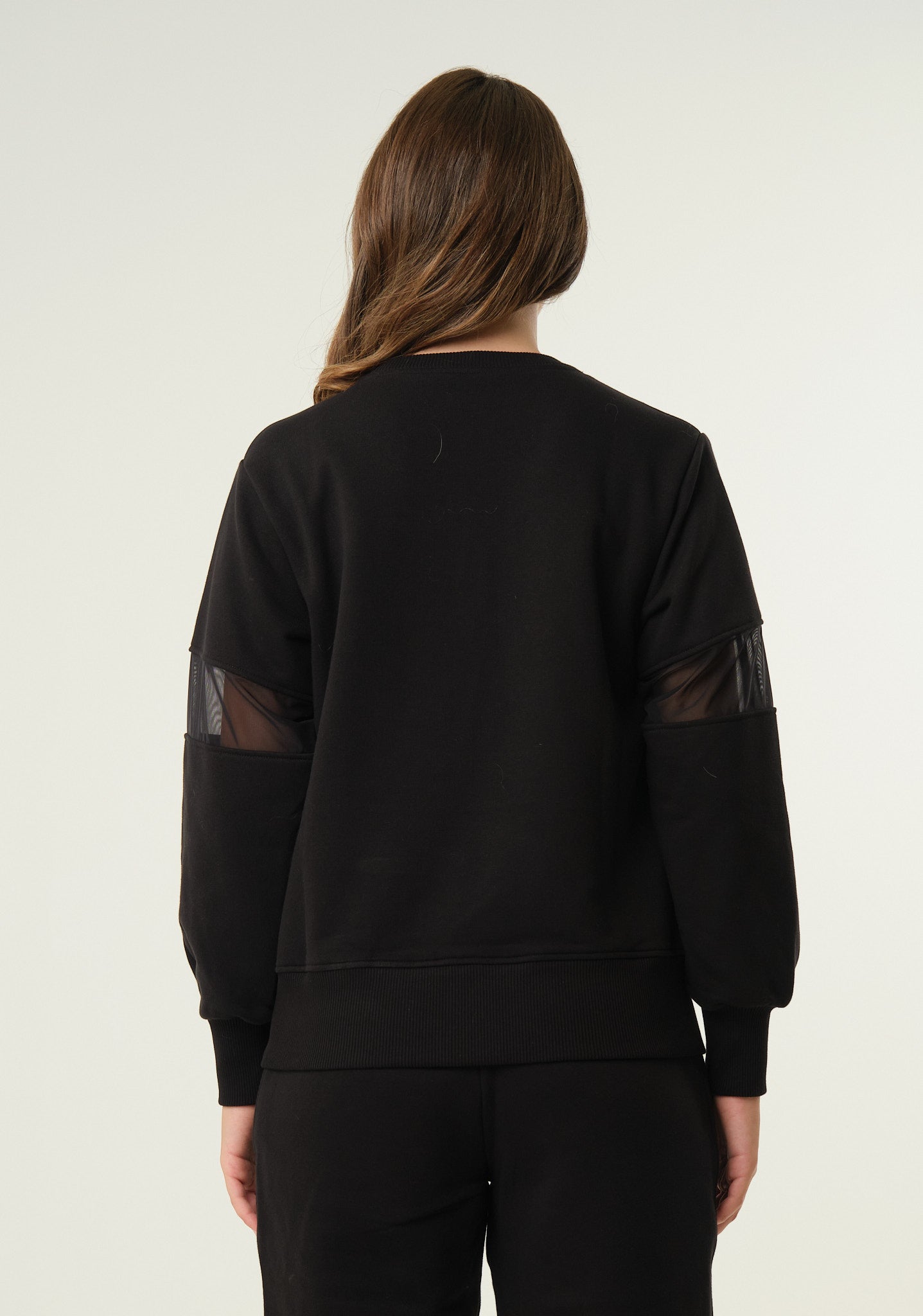 Felpa con inserti in mesh