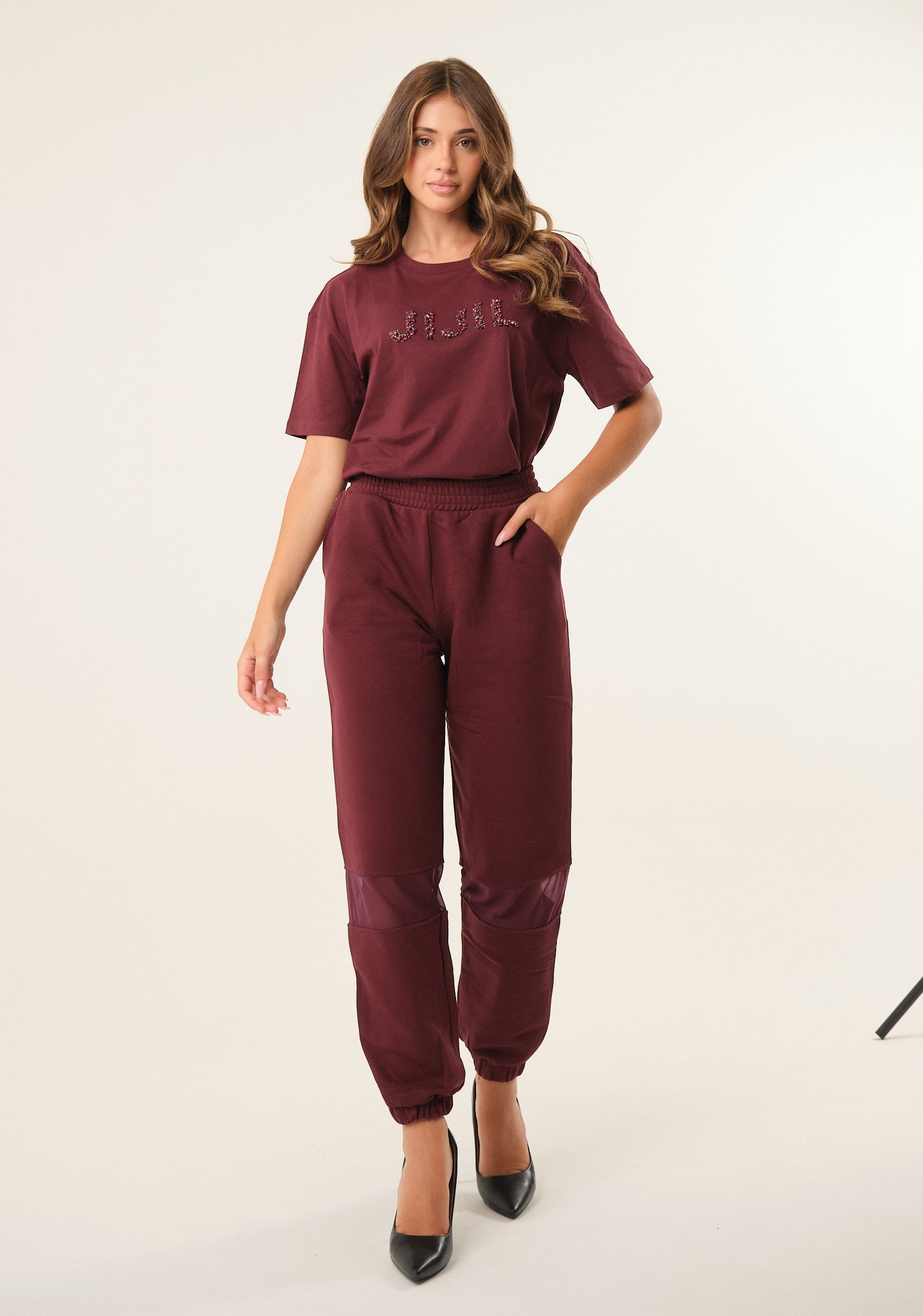 Pantalone tuta con inserti in mesh