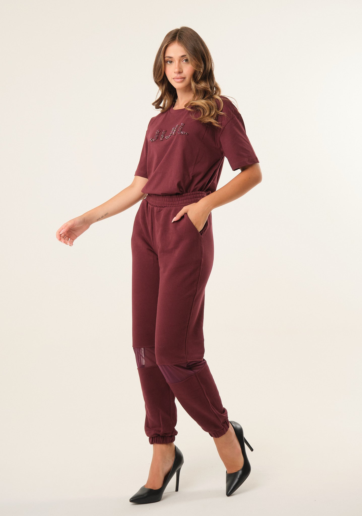 Pantalone tuta con inserti in mesh
