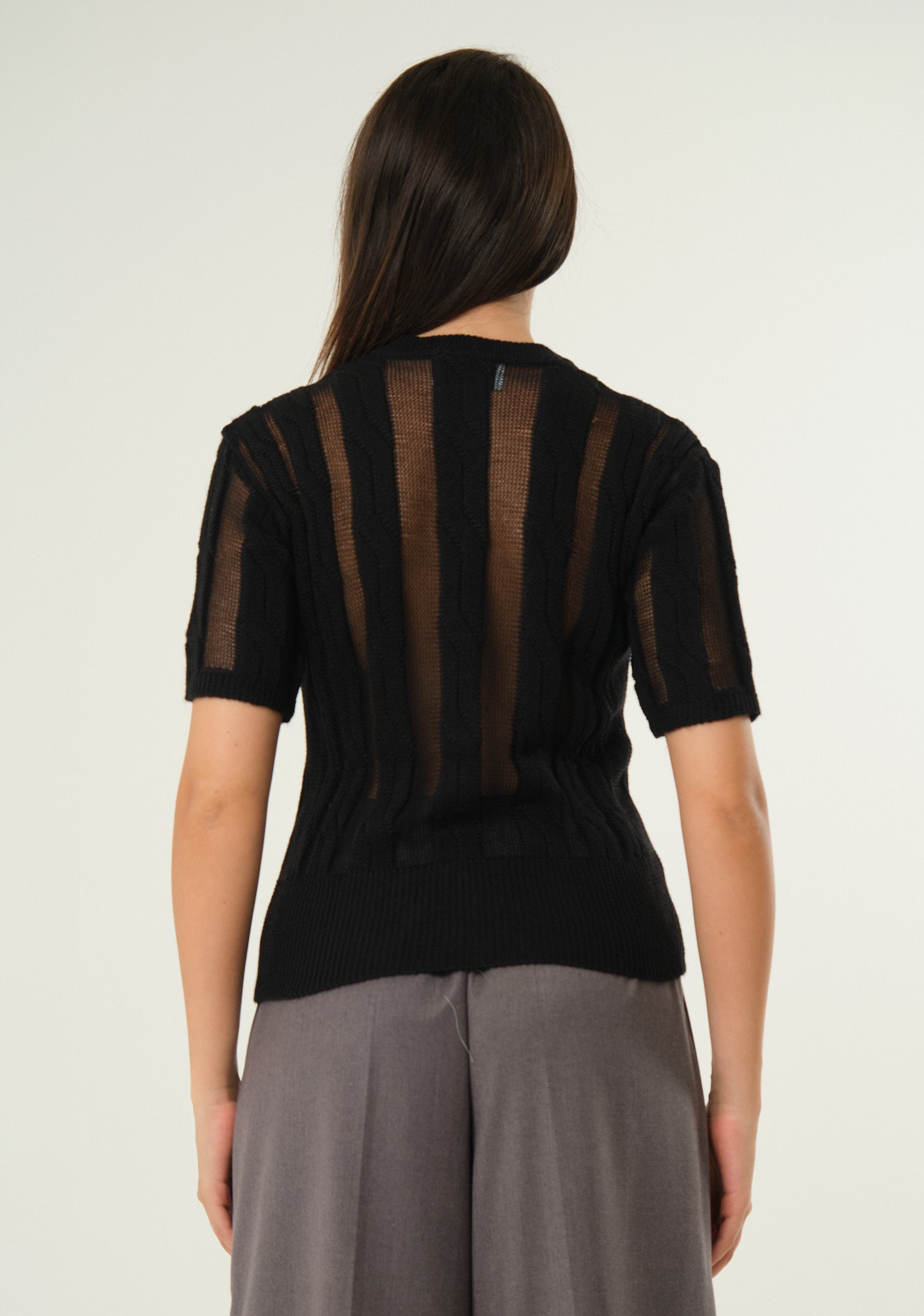 Maglia con lavorazione a trecce
