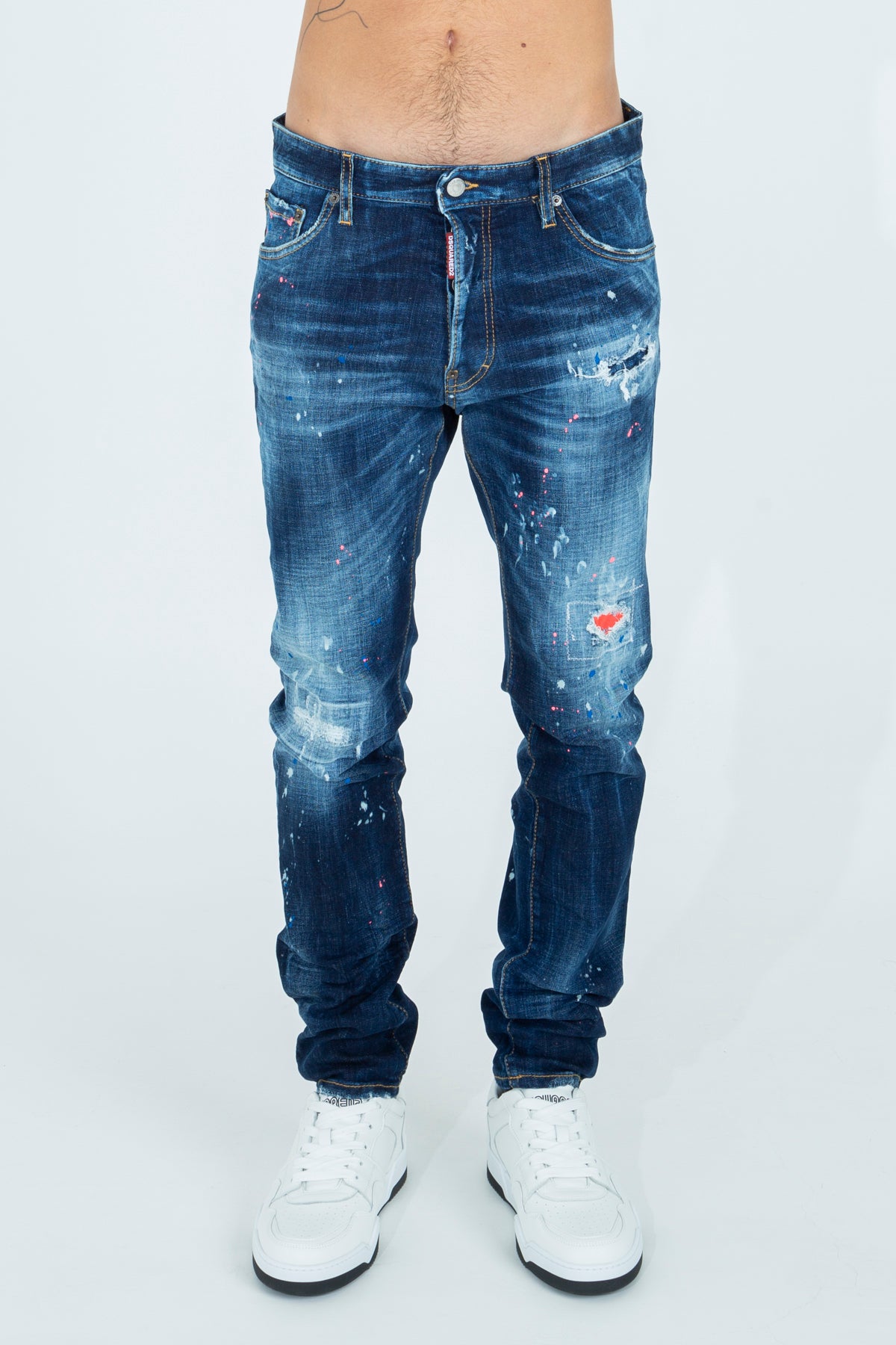 Jeans with rips and color stains