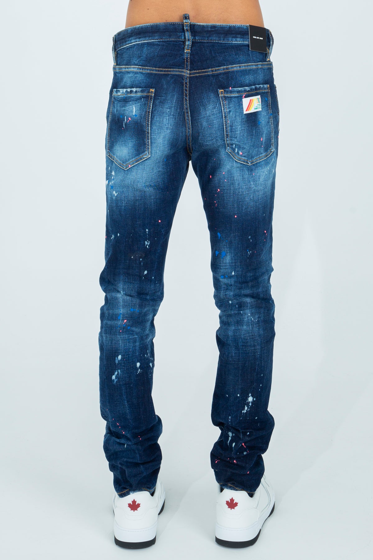 Jeans with rips and color stains