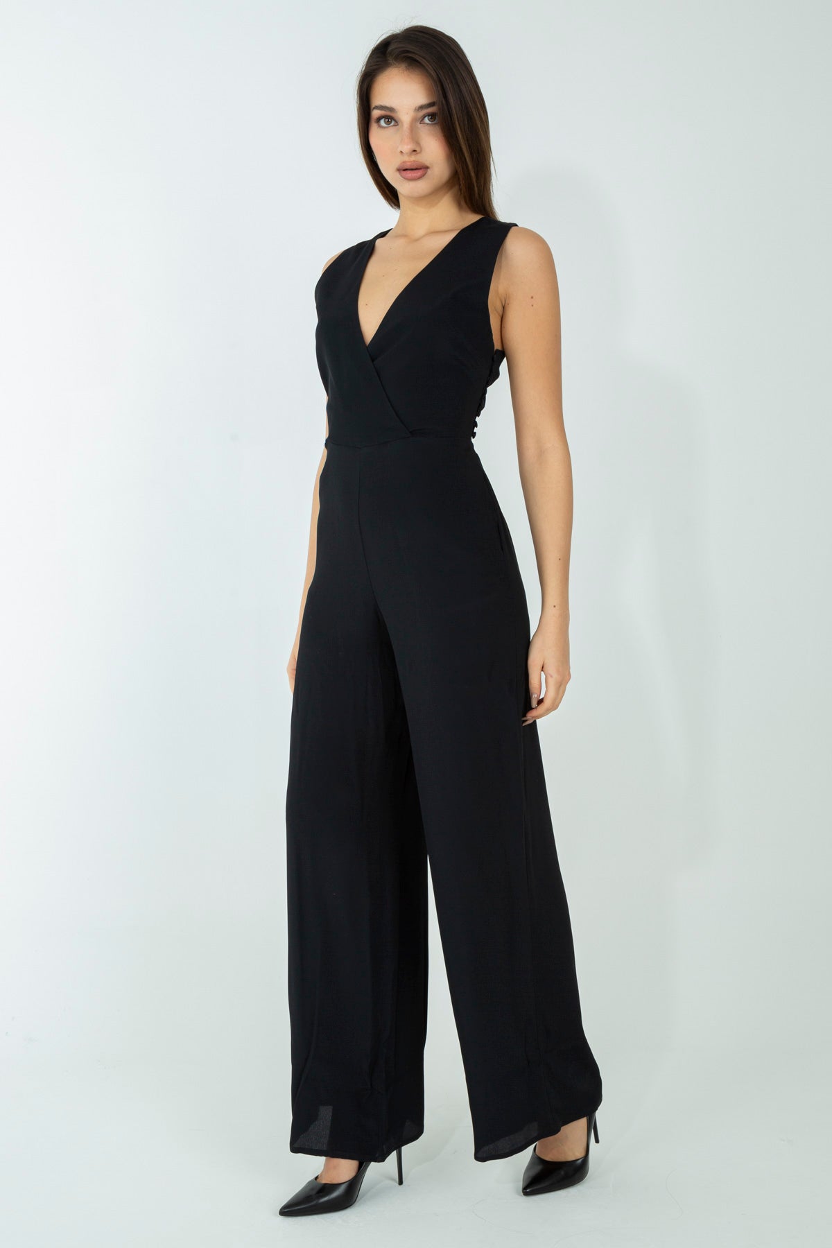 Tuta con arriccio posteriore